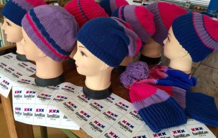 Photo Bi Pride beanies by Connie van Gils for the EuroBiCon Market